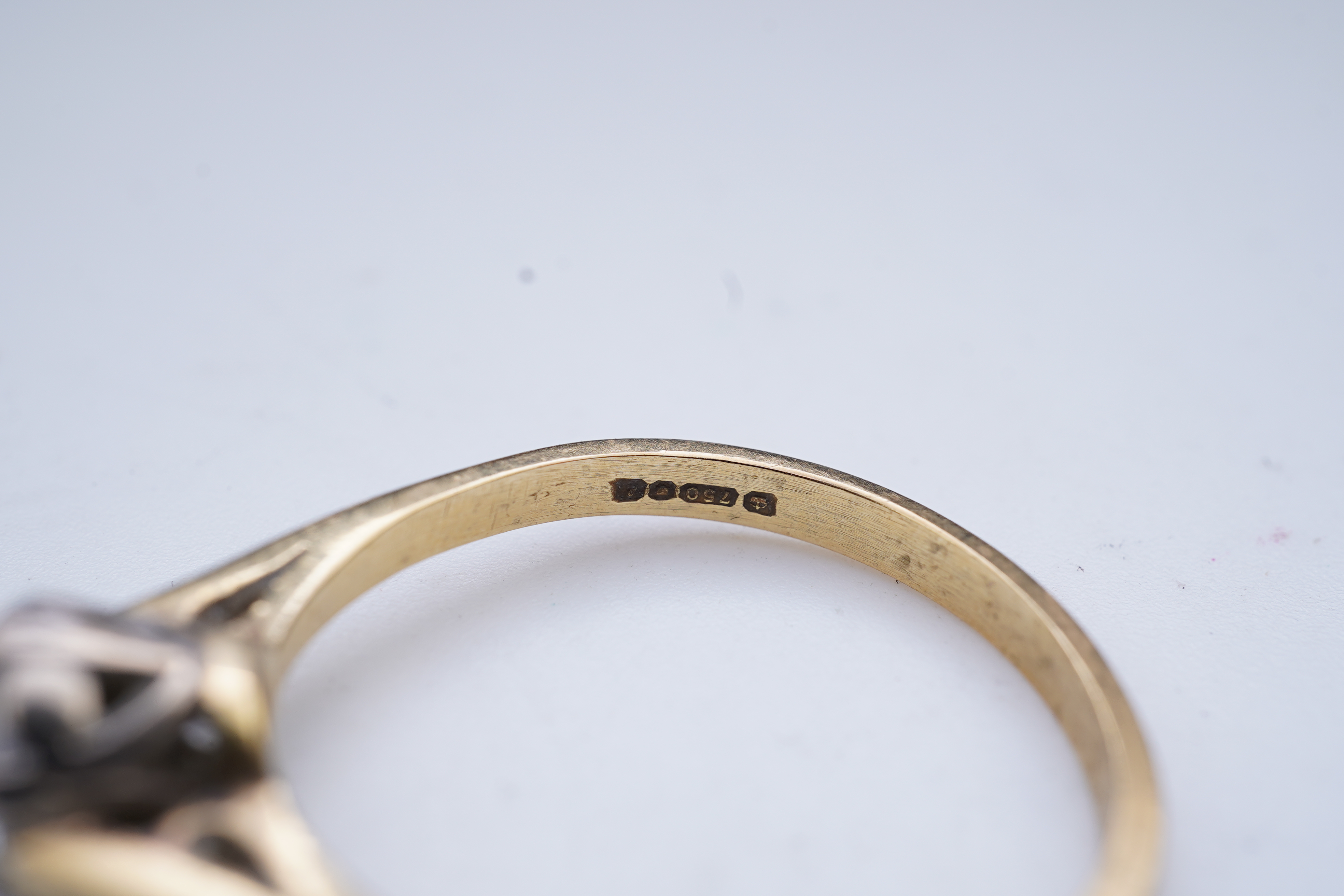 A diamond solitaire ring
